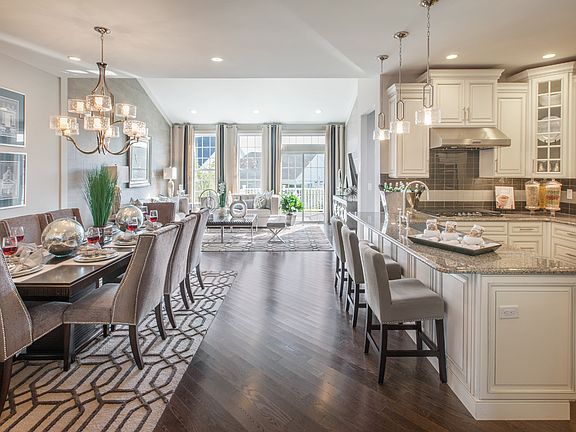 Dining area with additional breakfast bar in kitchen