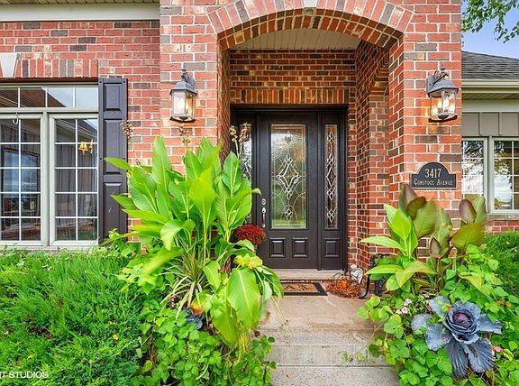 Warm and welcoming covered front porch!