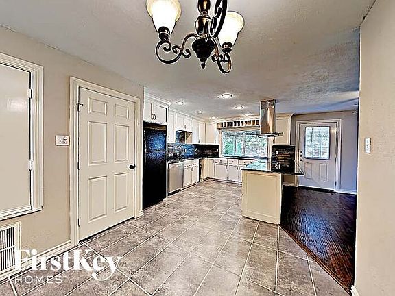 4th image of 9021 Millwood Dr