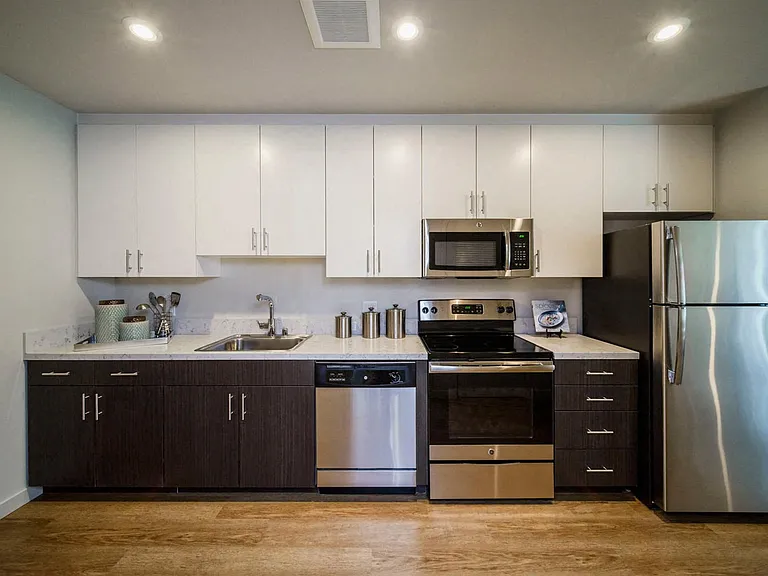 GE stainless steel appliances in modern kitchen