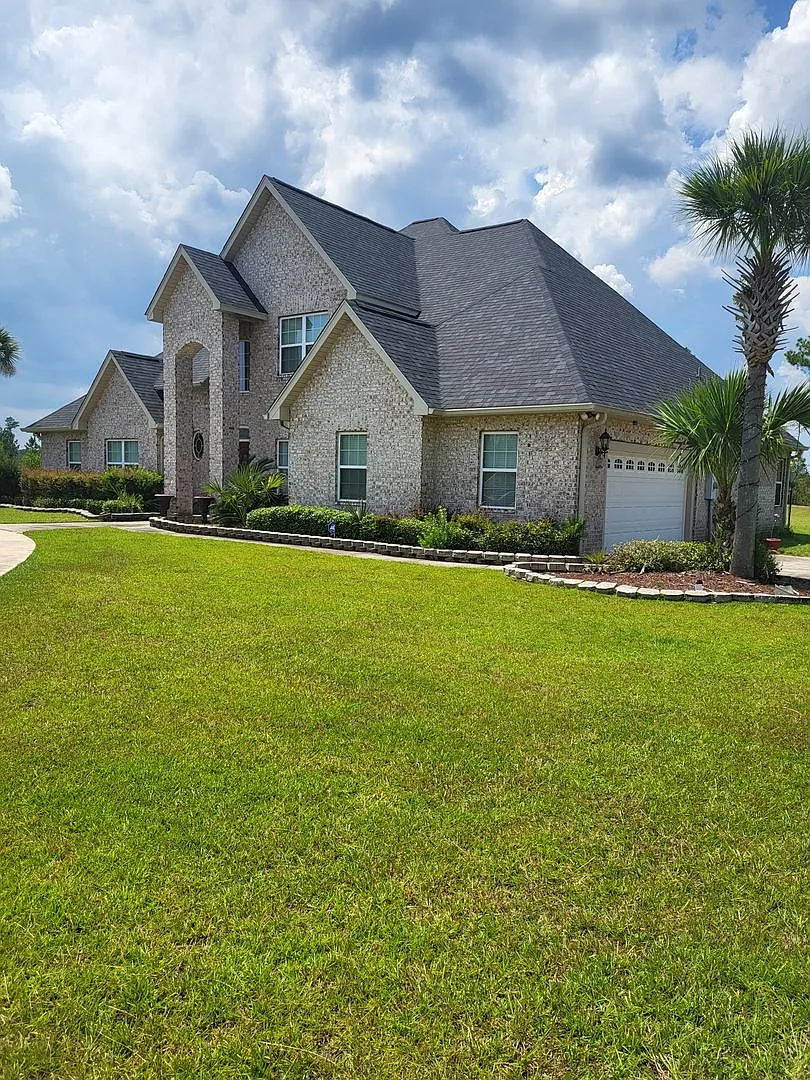 Fully furnished 5-bedroom home situated on nearly 4 acres of land!! — Photo 1