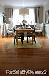 Dining Room - 1
						:
						Large dining room with drum pendant, neutral drapes, large window.