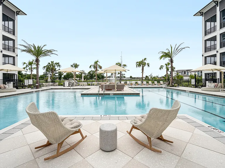 Resort-Style Pool with Sun Shelf and Grilling
