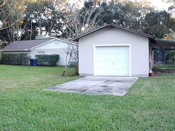 Workshop/Storage (extra) with Car Port (Included)