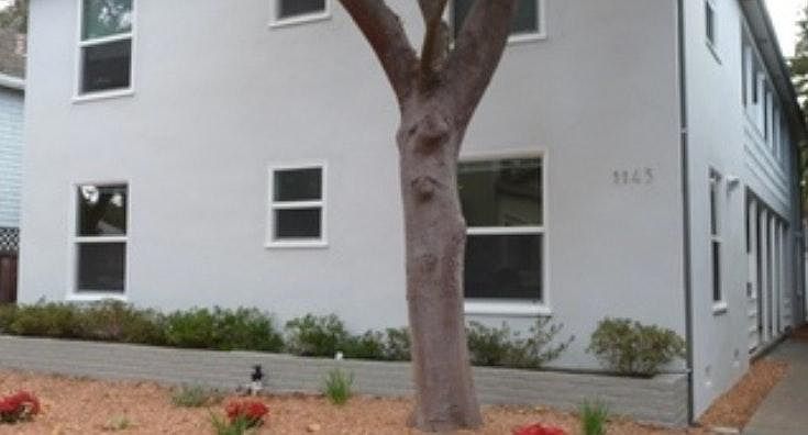 Quaint, well-maintained four unit building...