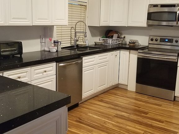 3rd image of 207 NE 3rd Ave