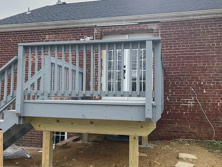Step out onto the elevated deck, which isperfect for grilling, morning coffee, or relaxing with friends while overlooking the expansive backyard.