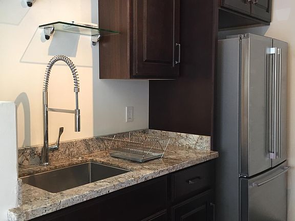 Kitchen with french door fridge shown