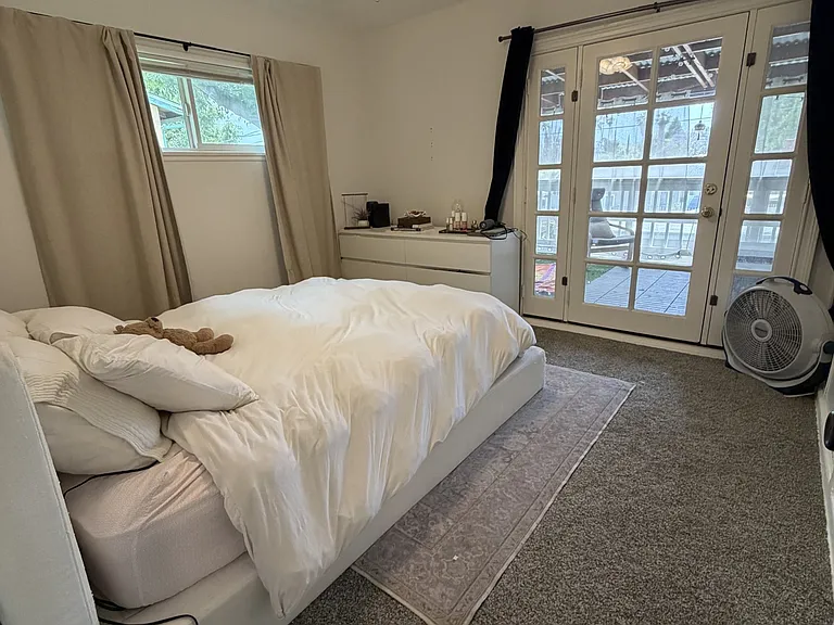 bedroom with recently installed carpet for comfort and sound proofing ( installed Jan 2026)