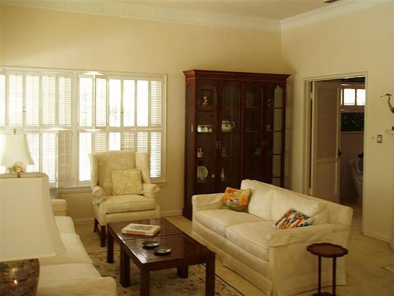 Formal Living Room w/high ceiling and crown moulding
