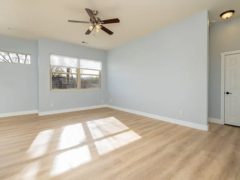From front door, to the right is a closet and the primary bedroom