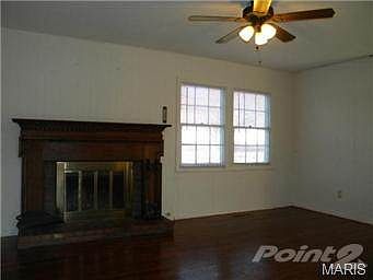 Family room with wood burning fireplace