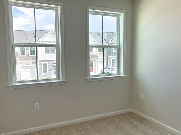 A secondary bedroom of the Northgate on homesite 1103 at Hiatt Pointe at Snowden Bridge.