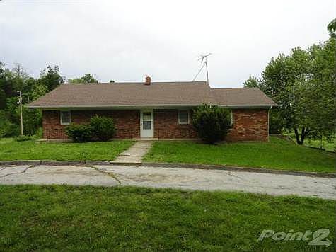 Ranch style home on 23 acres with three bedrooms and three baths and unfinished walk-out basement.