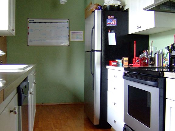 Kitchen with stainless steel kitchen suite.