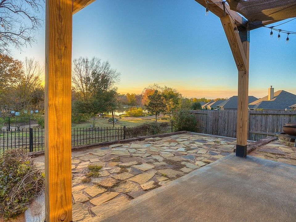 Backyard overlooking Memory Park with beautifully maintained walking trails right outside your door.