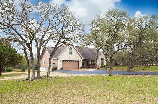 Beautiful home located on five acres.  Gated, fenced and cross fenced.