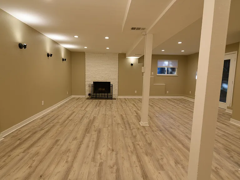 Rec Room/Family room downstairs. Plenty of room for a giant TV and surround system, or a place for kids to play.