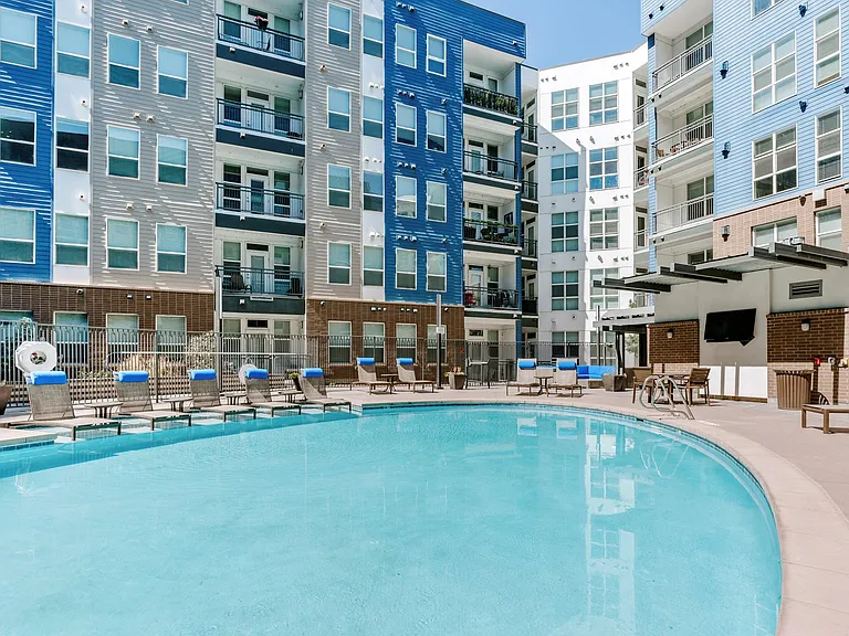 City House Apartments Pool Area and Lounge Chairs