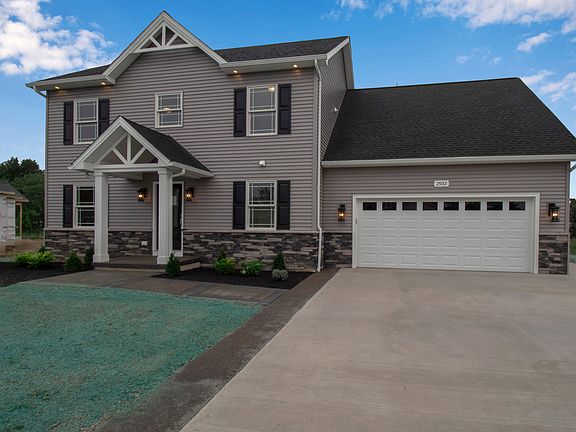 Front Exterior with Wide Driveway