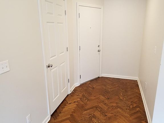 Your foyer is a great place for a small table or shoe rack.