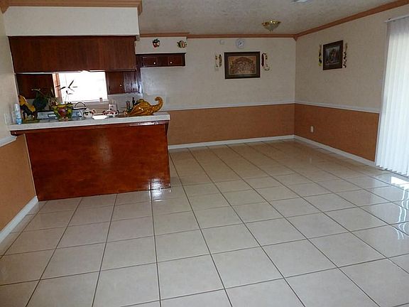 View of Dinning and Kitchen area from Den