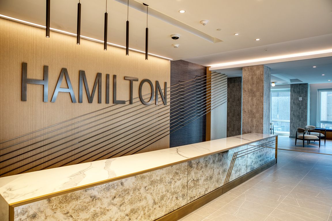 Welcome to Hamilton Crossing Apartments, where modern design meets luxury living. Enjoy our sleek lobby with stunning finishes, providing a perfect blend of elegance and comfort. Make your next move todayschedule a tour now!