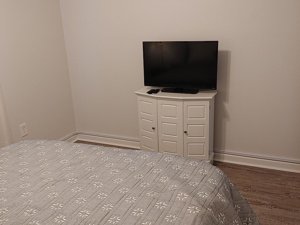 New TV and Cabinet in Bedroom