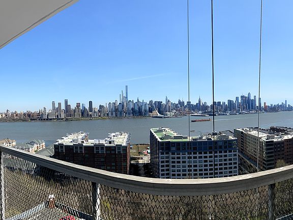 panaromic nyc skyline views from balcony
