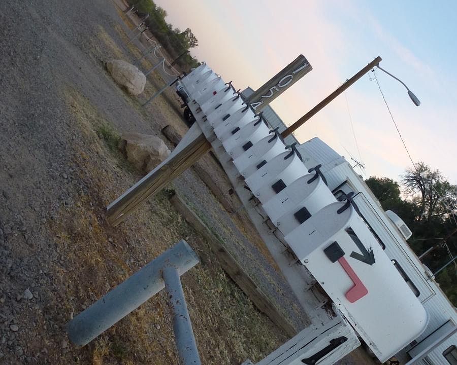 You'll want to turn just before the row of white mailboxes,