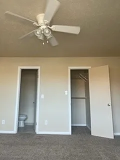 Primary Bedroom with walk-in closet and private bathroom Primary Bedroom with walk-in closet and private bathroom