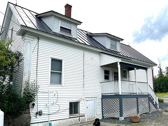 private entrance with bicycle/ski storage storage under deck
