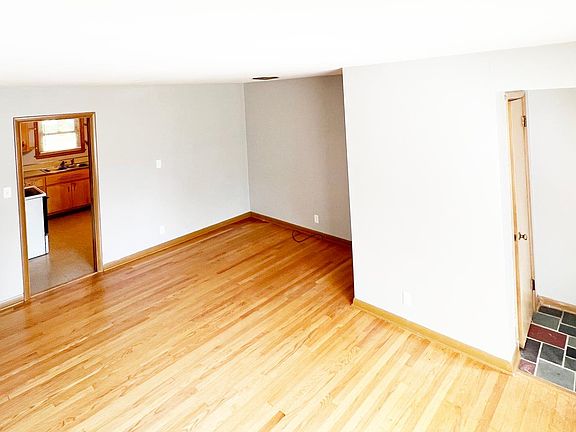 Joint Living and Dining Room with Entry Way