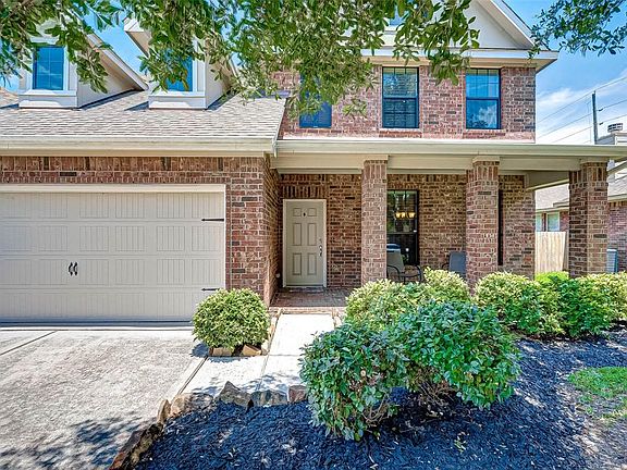 This welcoming and airy front porch is sure to be one of the many things you'll love about this house!