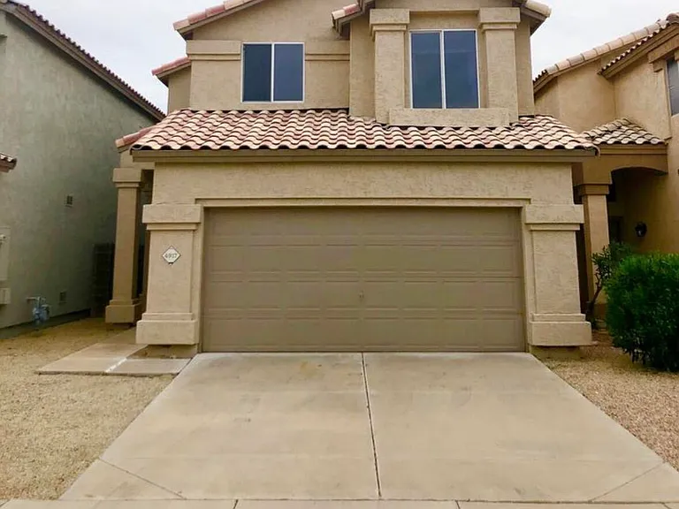 4917 W Behrend Dr — Photo 1