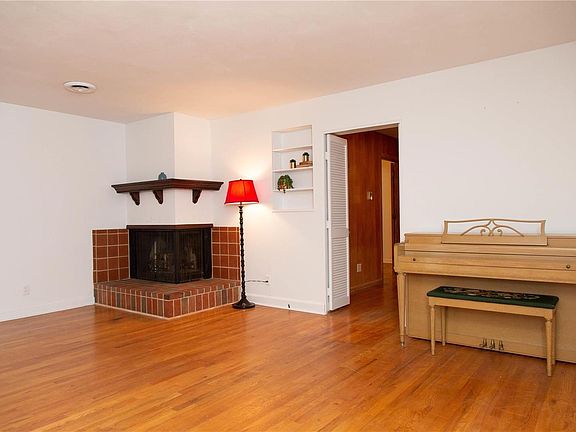 The living room is 19 x 13 and provides a gas fireplace.