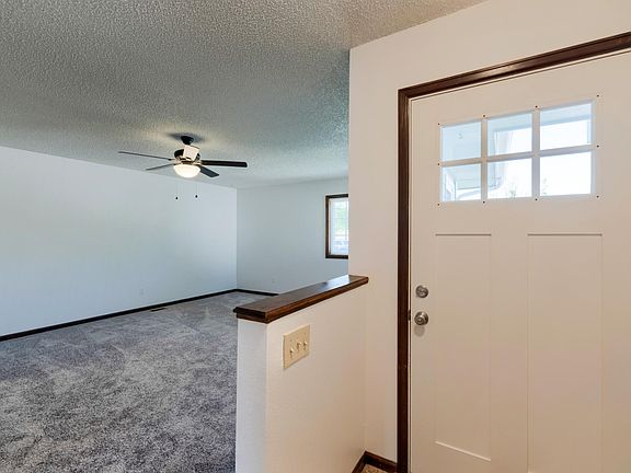 Living Room Ceiling Fan and Front Door