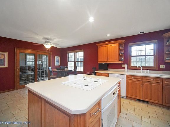 The multi-purpose kitchen has loads of cabinets and counters.