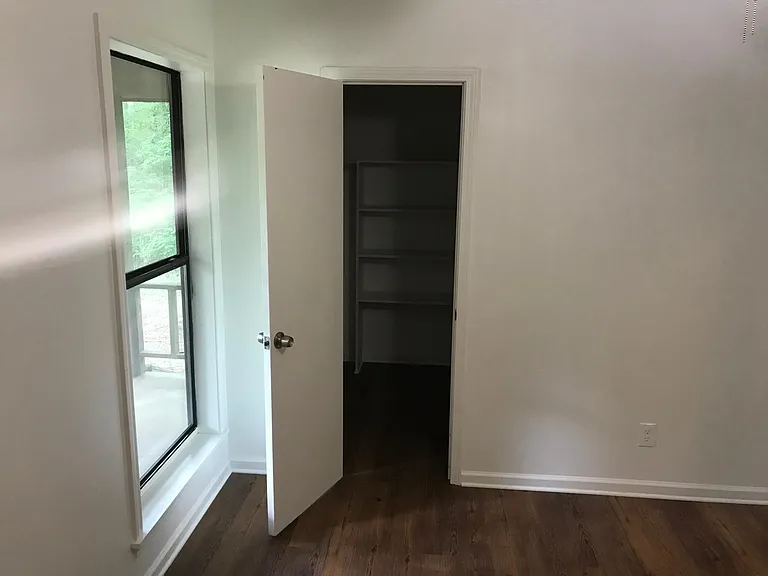 Second bedroom with walk-in closet.