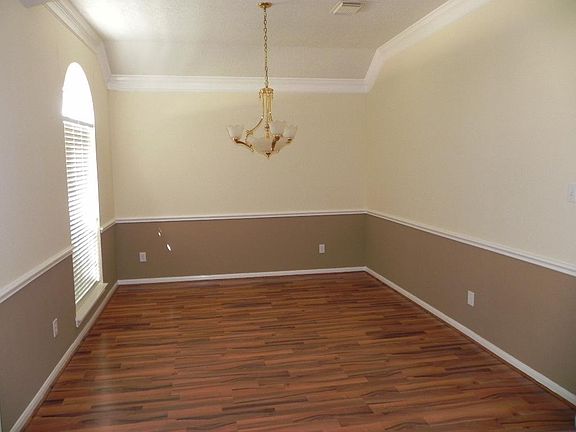 Beautiful Spacious Formal Dining Room  with Chair Rail