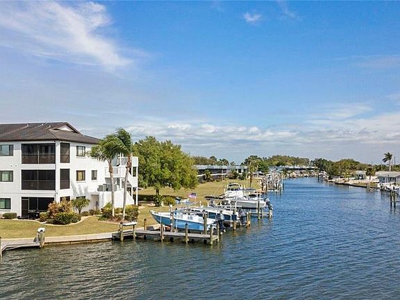 Top floor end unit with incredible views !