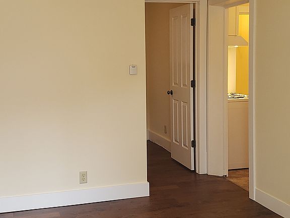 Living room, view toward kitchen and bedroom