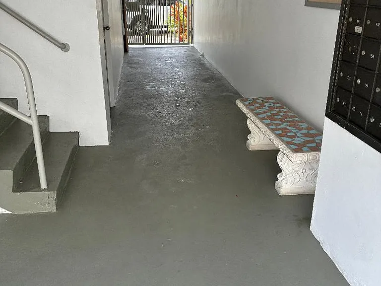 HALLWAY ENTRANCE TO APT AT LIDO BAY