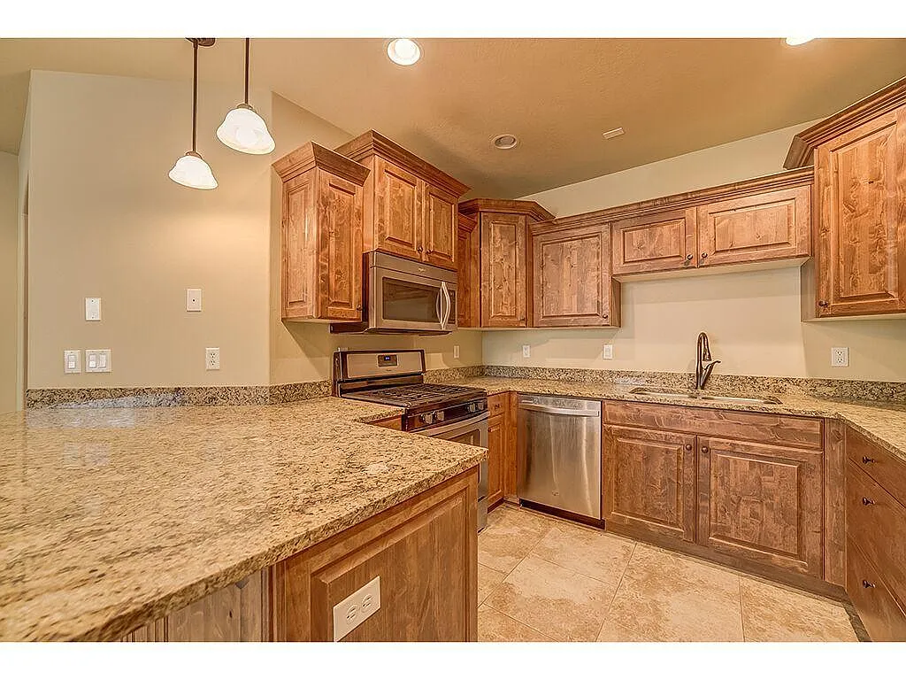 Kitchen additional view - 5198 N University Ave #202