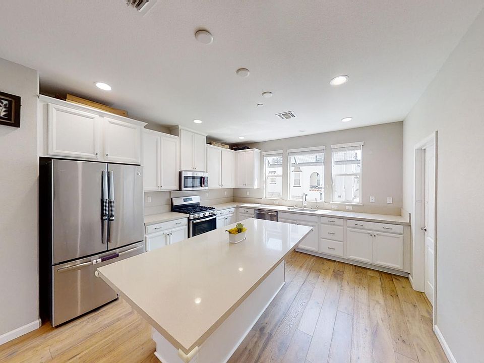 kitchen with white cabinets