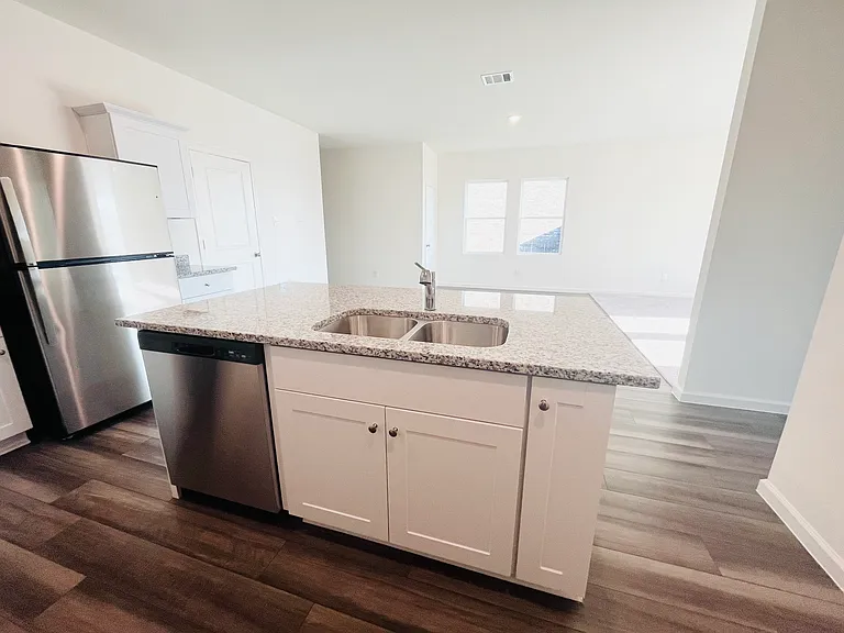 Kitchen with Dishwasher and double sink on island