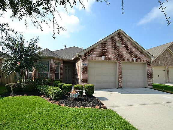 Front view of this enchanting home located at 27527 Gatlin Ln. on a quiet cul-de-sac lot.