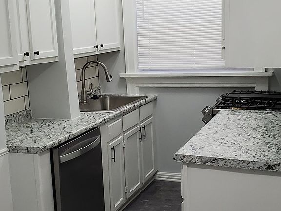Brand new kitchen rehab with updated floors, brand new appliances including convection oven, dishwasher, refrigerator, double-wide sink.