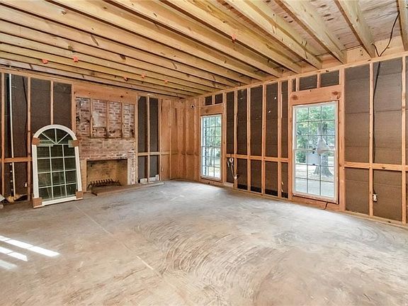 Formal living room/ office with fireplace