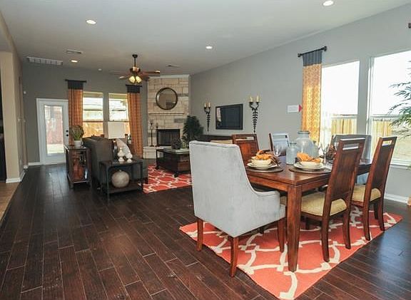 Photo of Model Home with Same Floor Plan, Not of Actual Home Listed